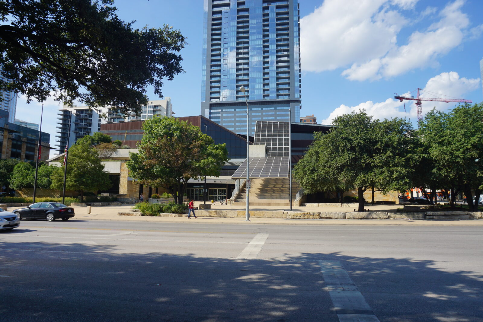 Austin City Hall, the seat of municipal government, beside Lady Bird Lake